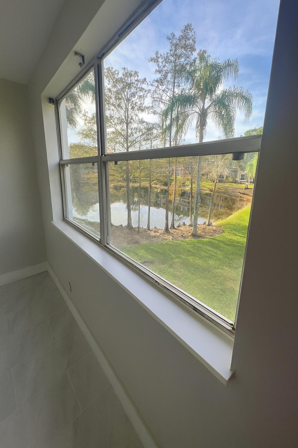 9055 Wiles Road, Unit 208 Coral Springs, FL 33067 - Photo 22 of 35 a view of a room with a large window