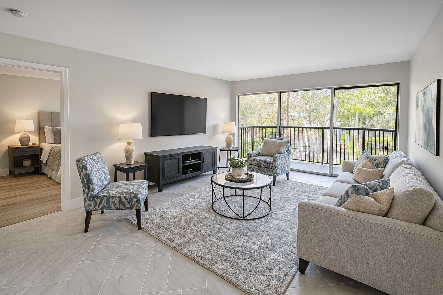 9055 Wiles Road, Unit 208 Coral Springs, FL 33067 - Photo 7 of 35 a living room with furniture a fireplace and a floor to ceiling window