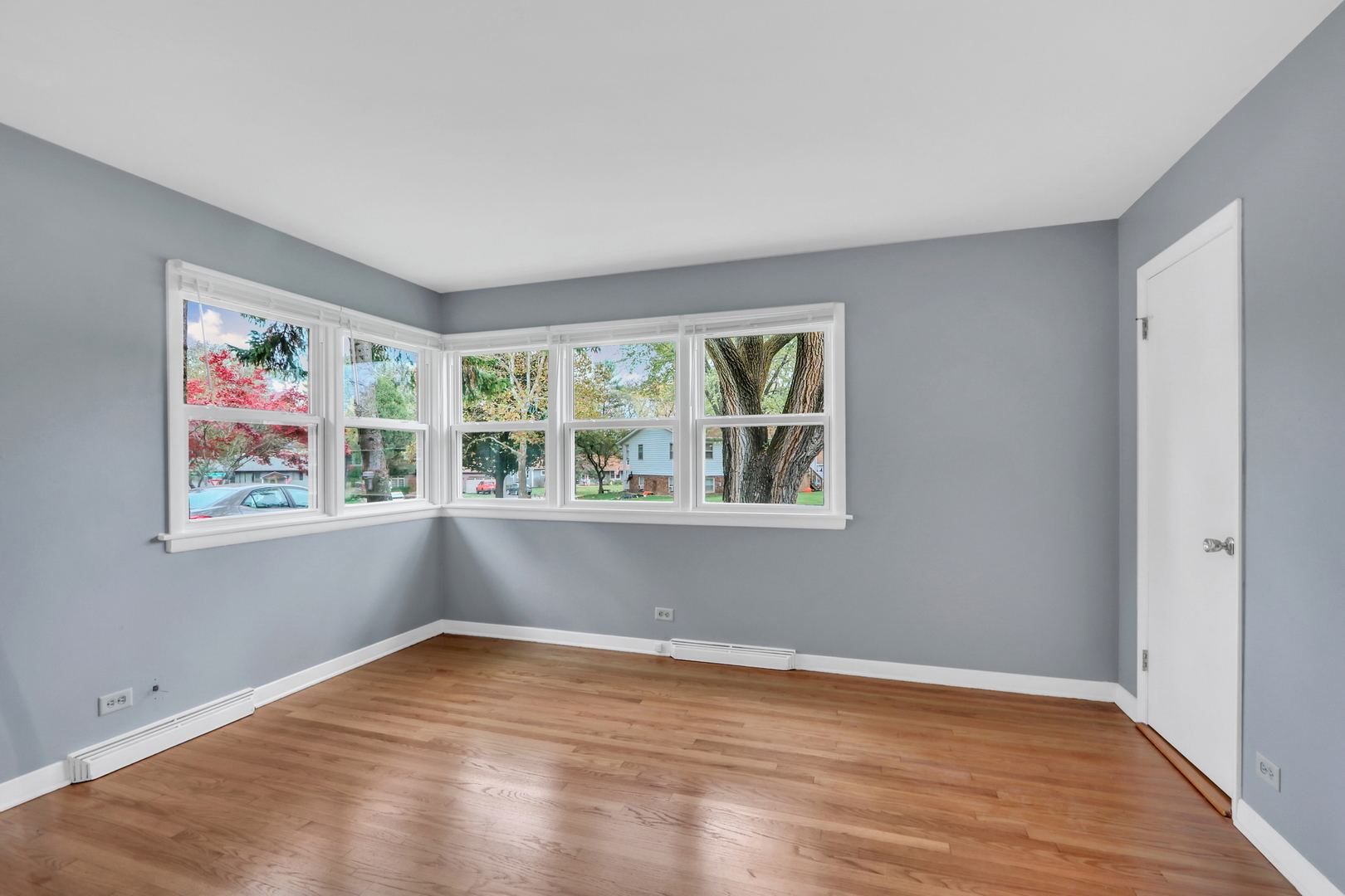 1186 Highland Road Mundelein, IL 60060 - Photo 22 of 28 a view of room with window and hardwood floor