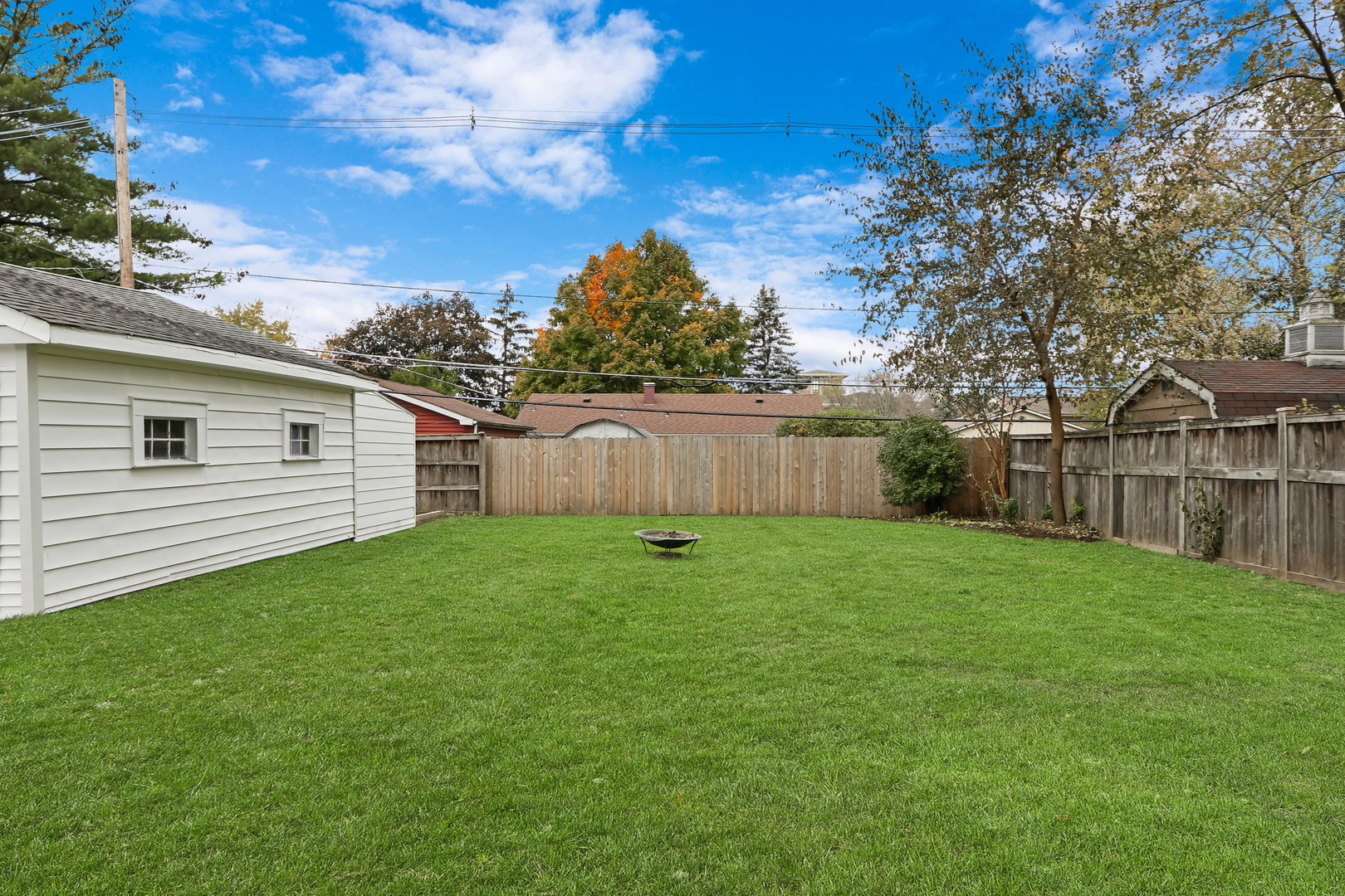 1186 Highland Road Mundelein, IL 60060 - Photo 25 of 28 a view of a backyard with large trees