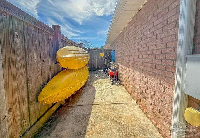 a bathroom with a toilet and shower