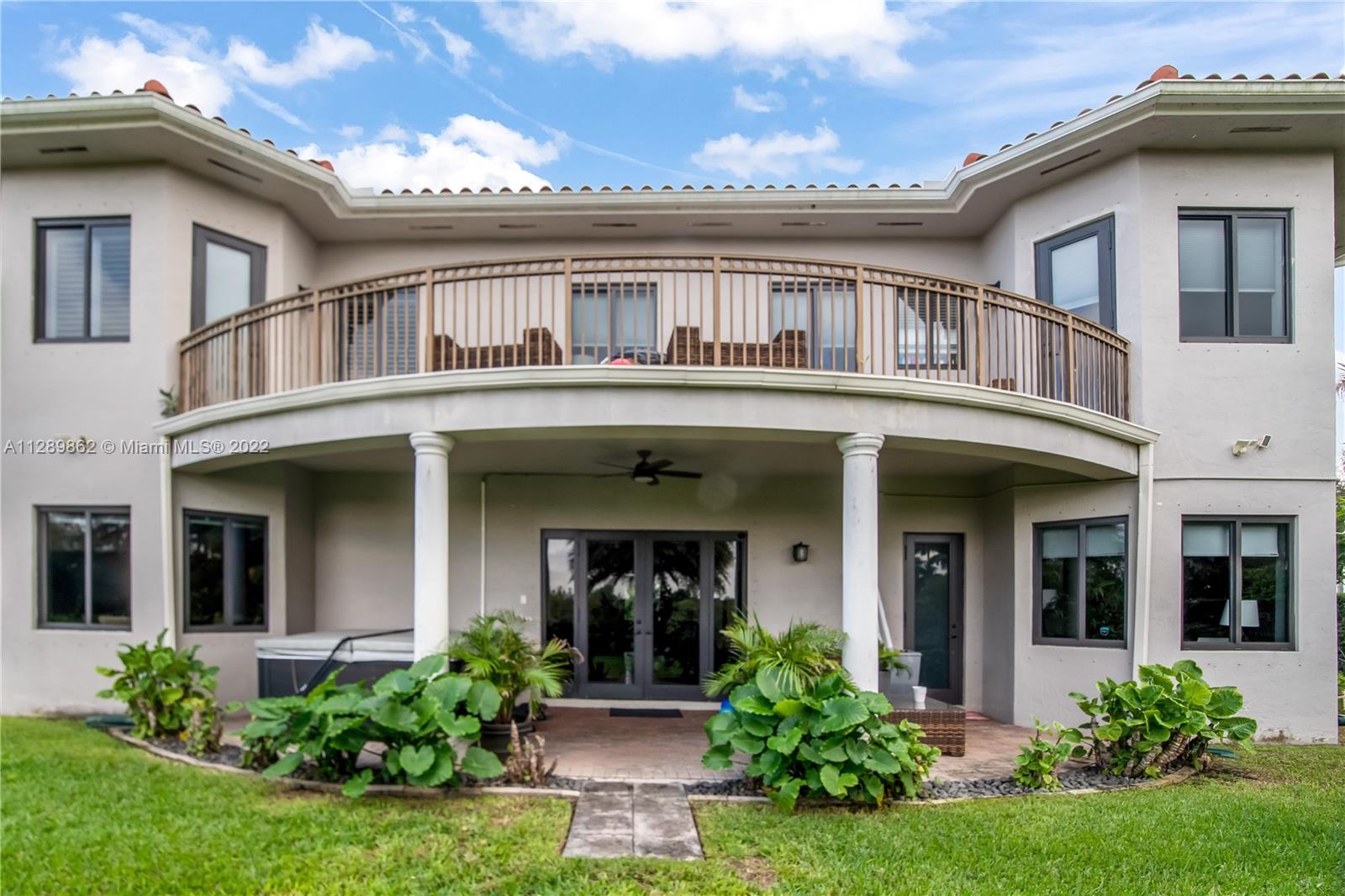 7783 Southwest 188th Street Cutler Bay, FL 33157 - Photo 60 of 70 front view of house with a yard