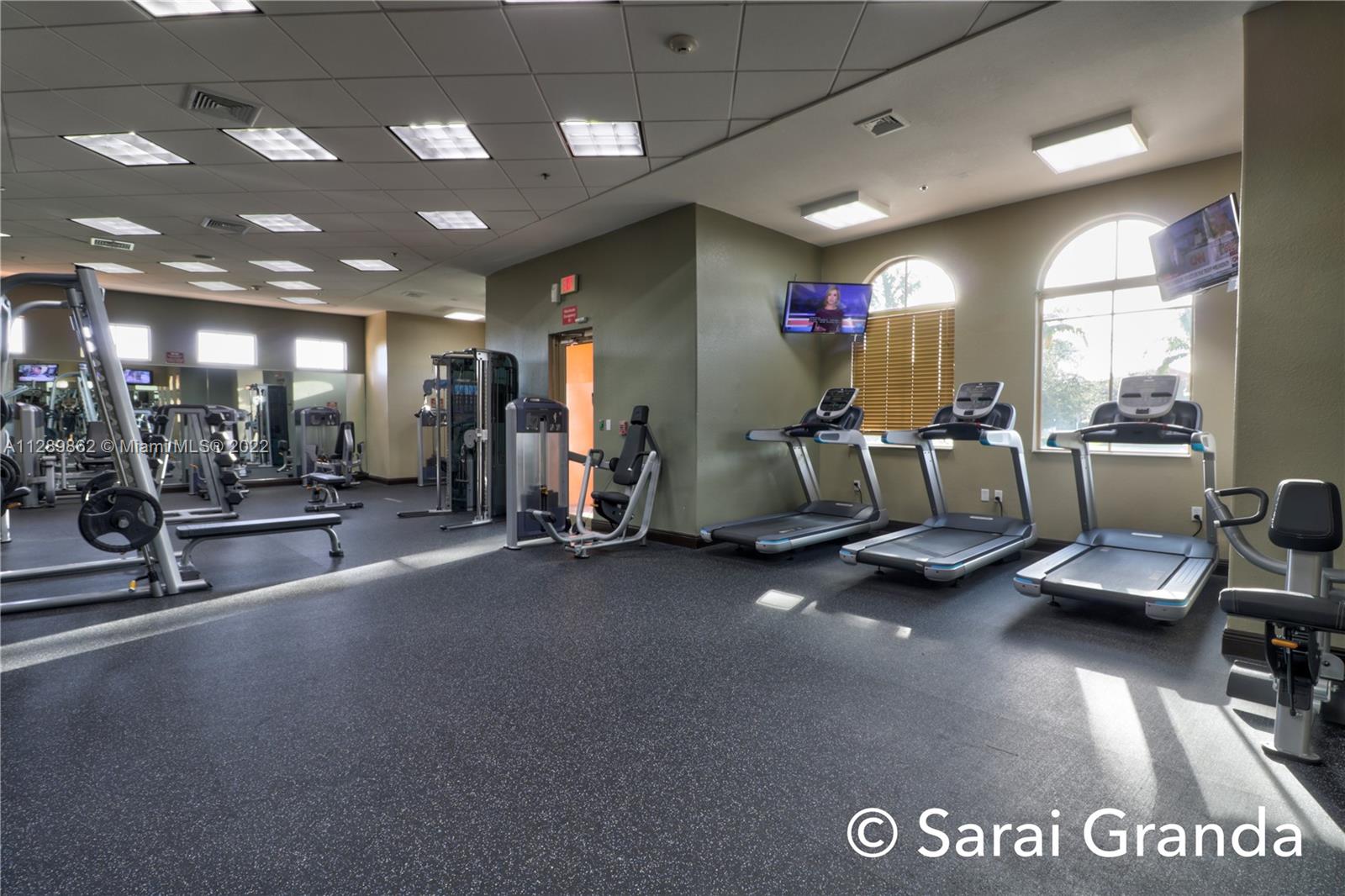 7783 Southwest 188th Street Cutler Bay, FL 33157 - Photo 70 of 70 a view of a gym room with gym equipment