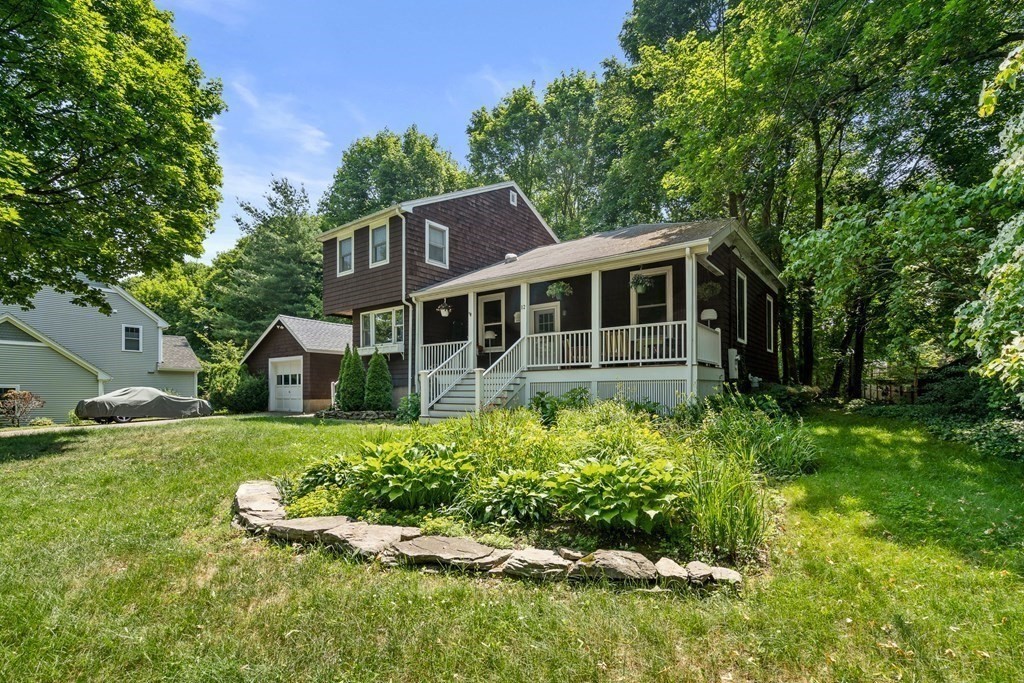12 Higgins Road Marblehead, MA 01945 - Photo 1 of 31 front view of a house with a yard