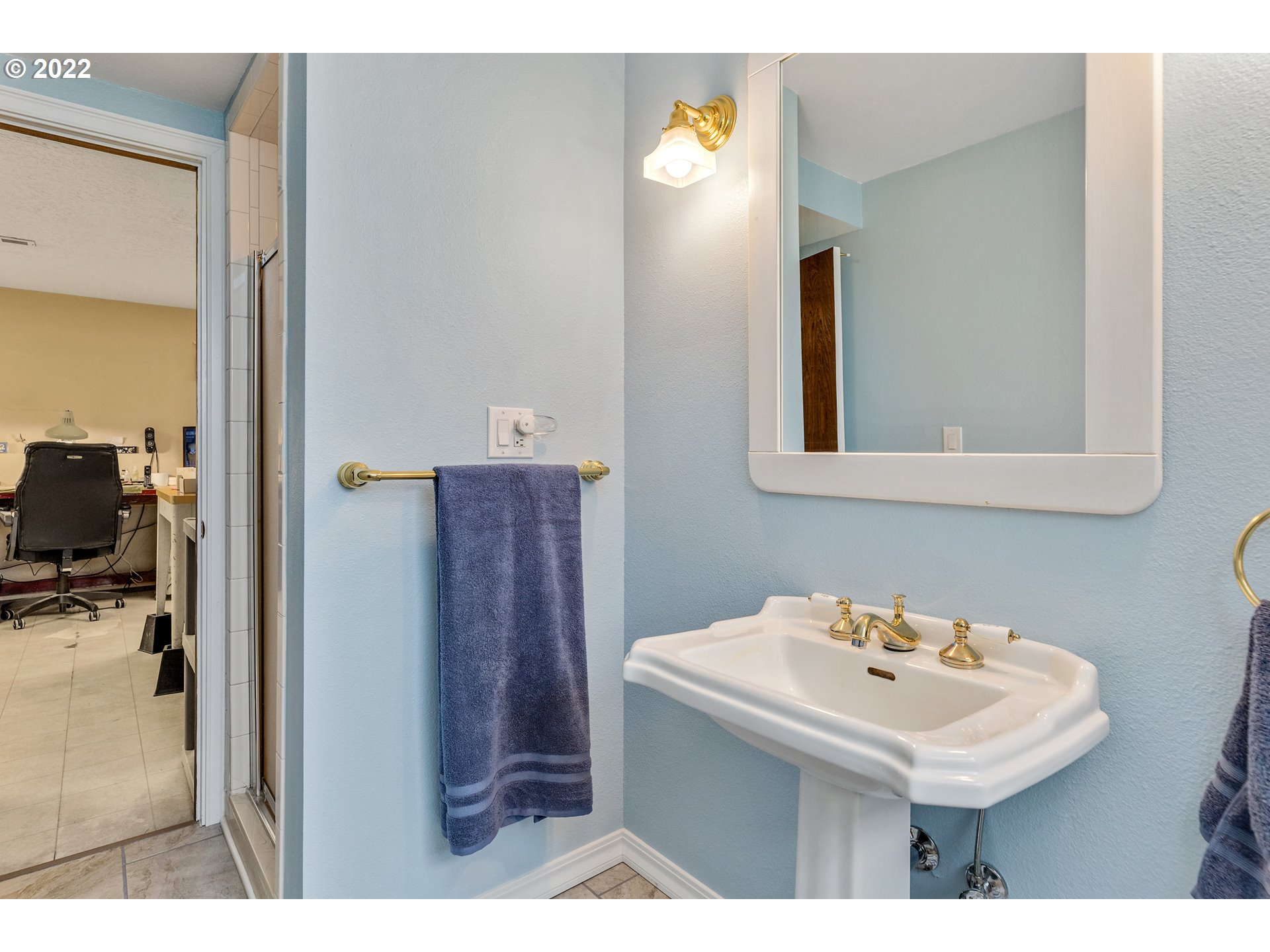 30026 Southeast Chase Road Gresham, OR 97080 - Photo 17 of 32 a bathroom with a sink and mirror