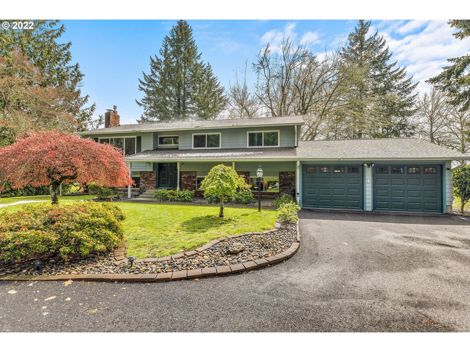 30026 Southeast Chase Road Gresham, OR 97080 - Photo 32 of 32 a front view of a house with a yard