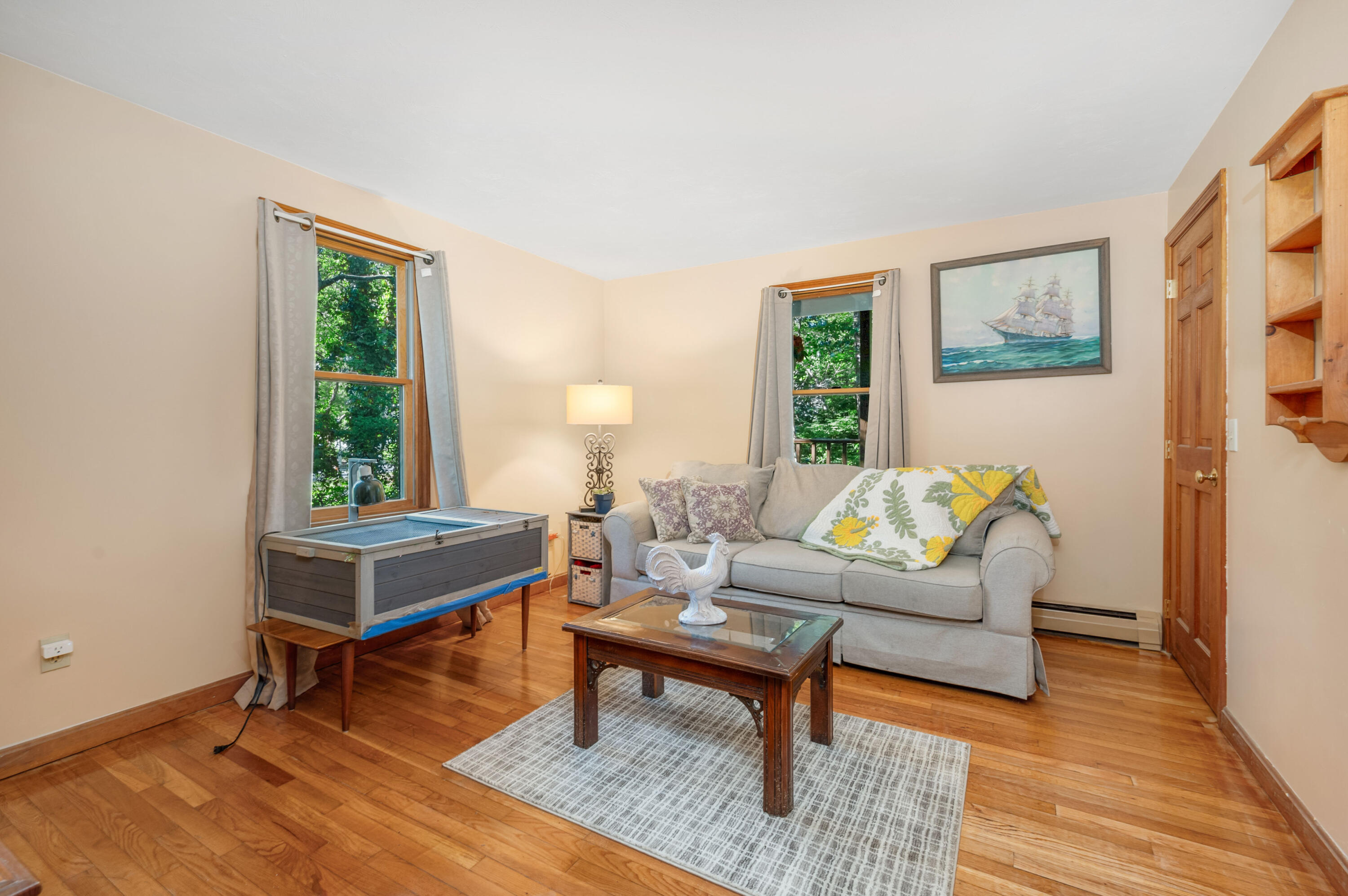 364 Jones Road Marstons Mills, MA 02648 - Photo 12 of 24 a living room with furniture a rug and a window