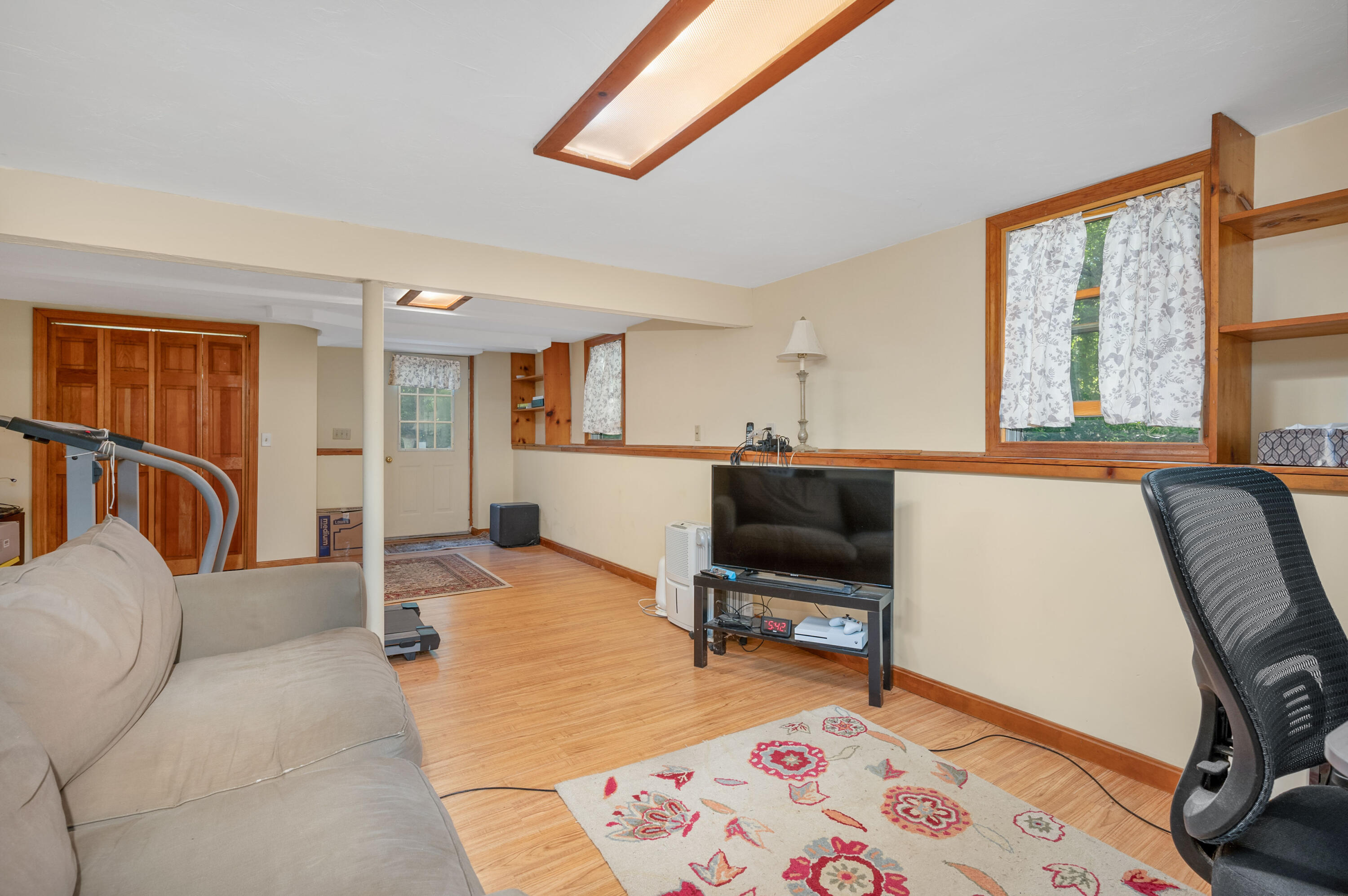 364 Jones Road Marstons Mills, MA 02648 - Photo 16 of 24 a bed room with a bed and a chair