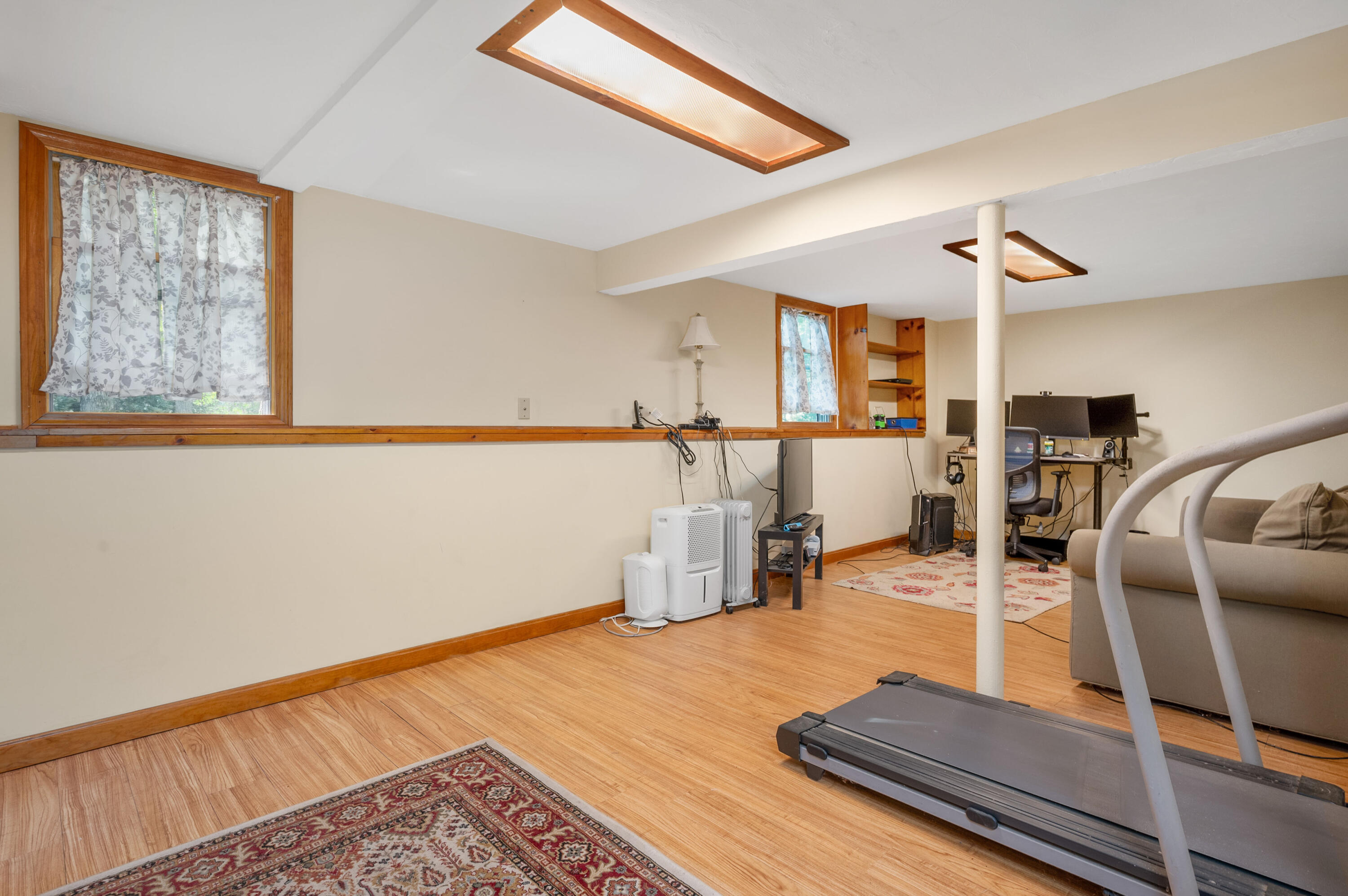 364 Jones Road Marstons Mills, MA 02648 - Photo 17 of 24 a room with gym equipment and view of living room