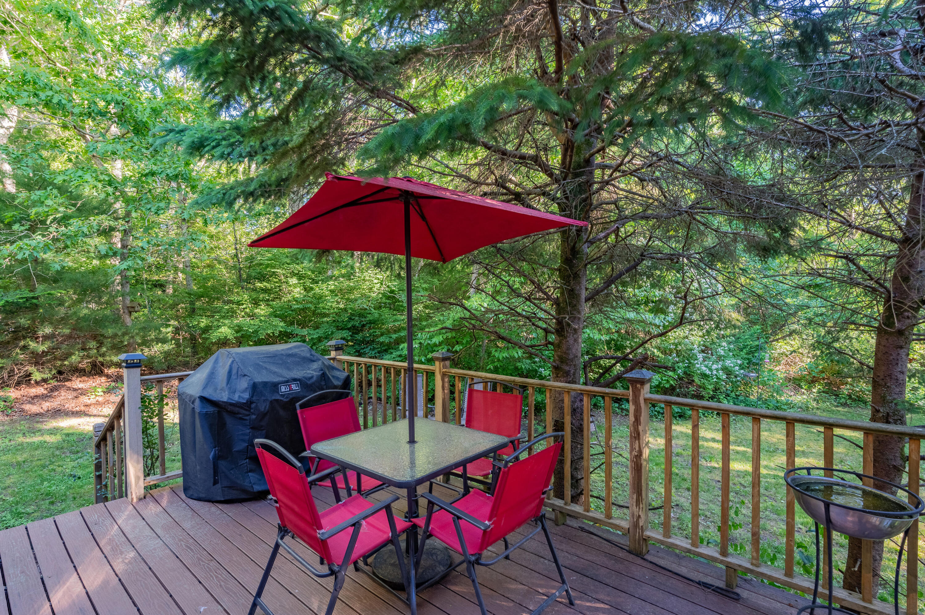364 Jones Road Marstons Mills, MA 02648 - Photo 21 of 24 a view of balcony with outdoor seating and wooden floor