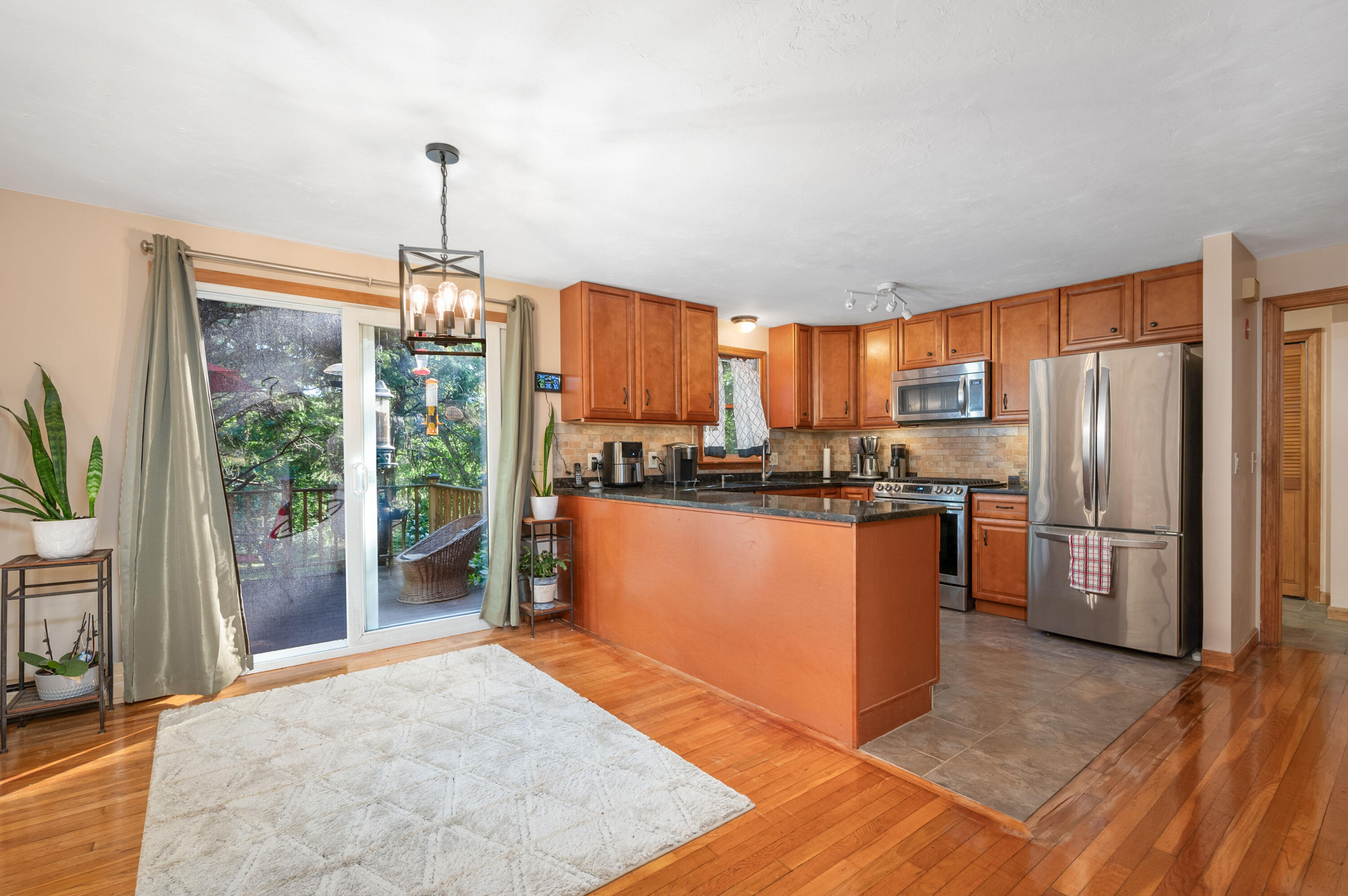 364 Jones Road Marstons Mills, MA 02648 - Photo 8 of 24 a kitchen with stainless steel appliances granite countertop a refrigerator a oven and a sink