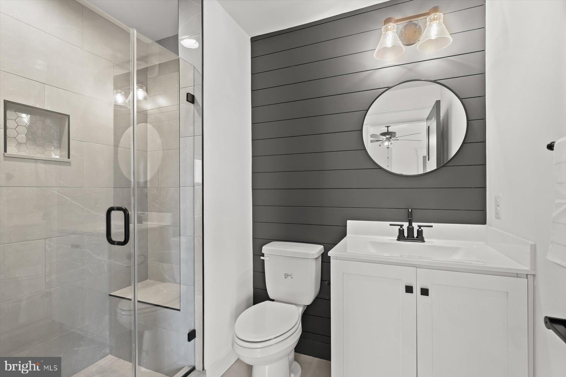 2 Snydersburg Road Westminster, MD 21157 - Photo 26 of 33 a bathroom with a toilet sink and shower