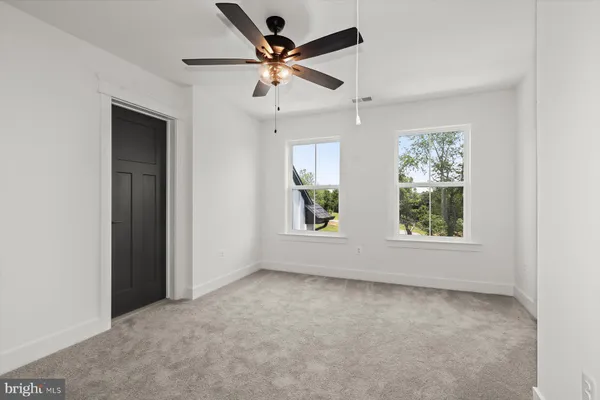 a bathroom with a toilet and a sink