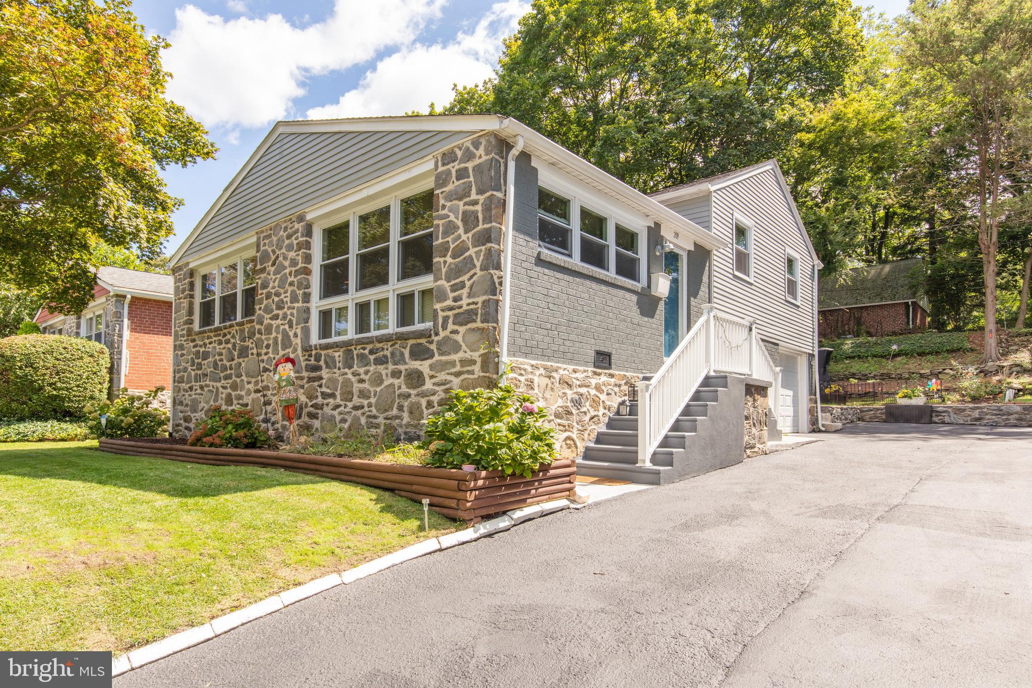 209 Glendale Road Havertown, PA 19083 - Photo 2 of 38 a front view of a house with a yard