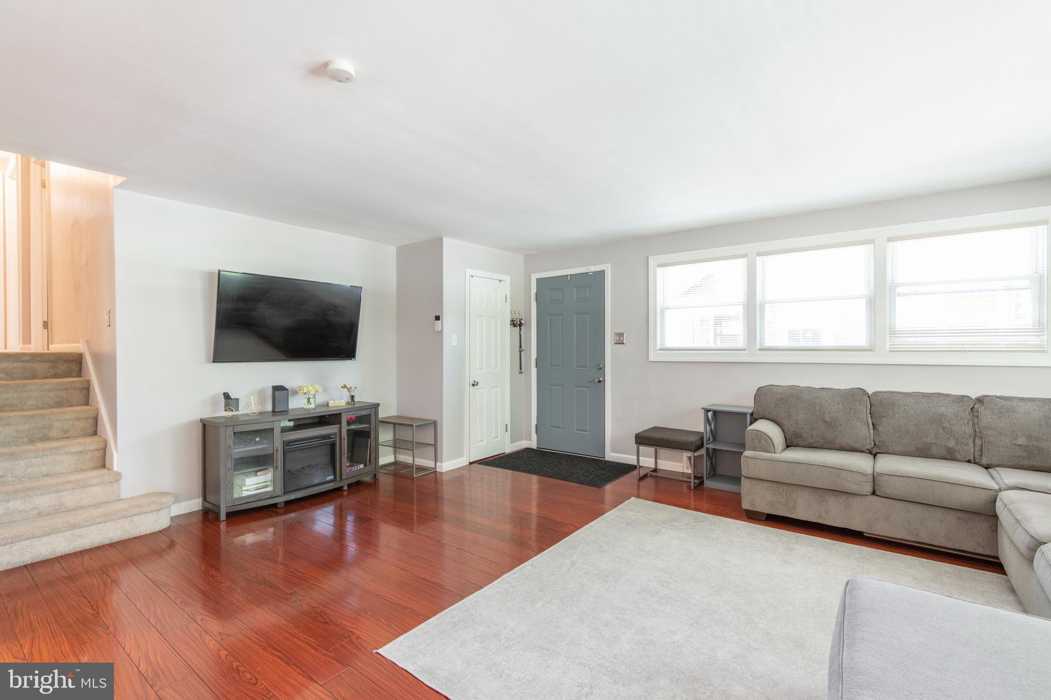 209 Glendale Road Havertown, PA 19083 - Photo 12 of 38 a living room with furniture and a flat screen tv