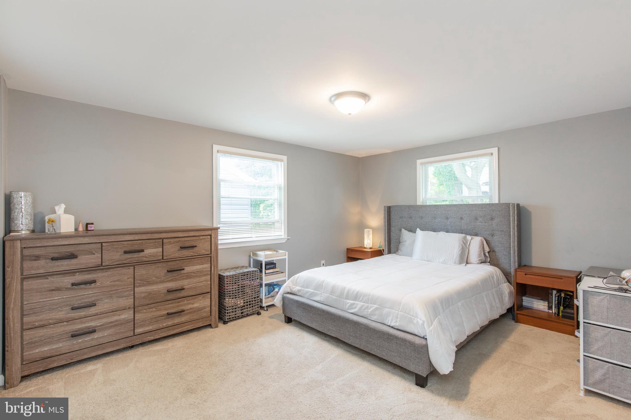 209 Glendale Road Havertown, PA 19083 - Photo 13 of 38 a bedroom with a bed and a dresser