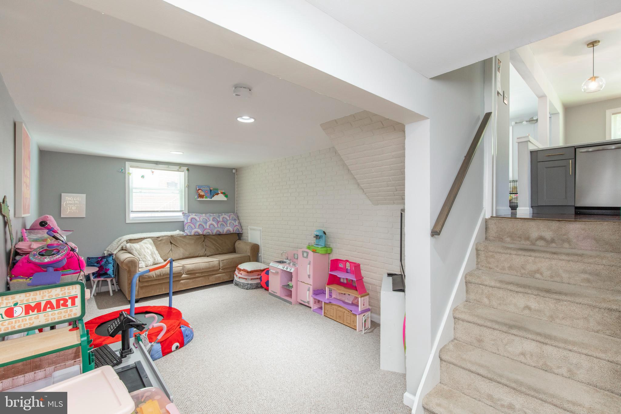 209 Glendale Road Havertown, PA 19083 - Photo 26 of 38 a living room with furniture and toys