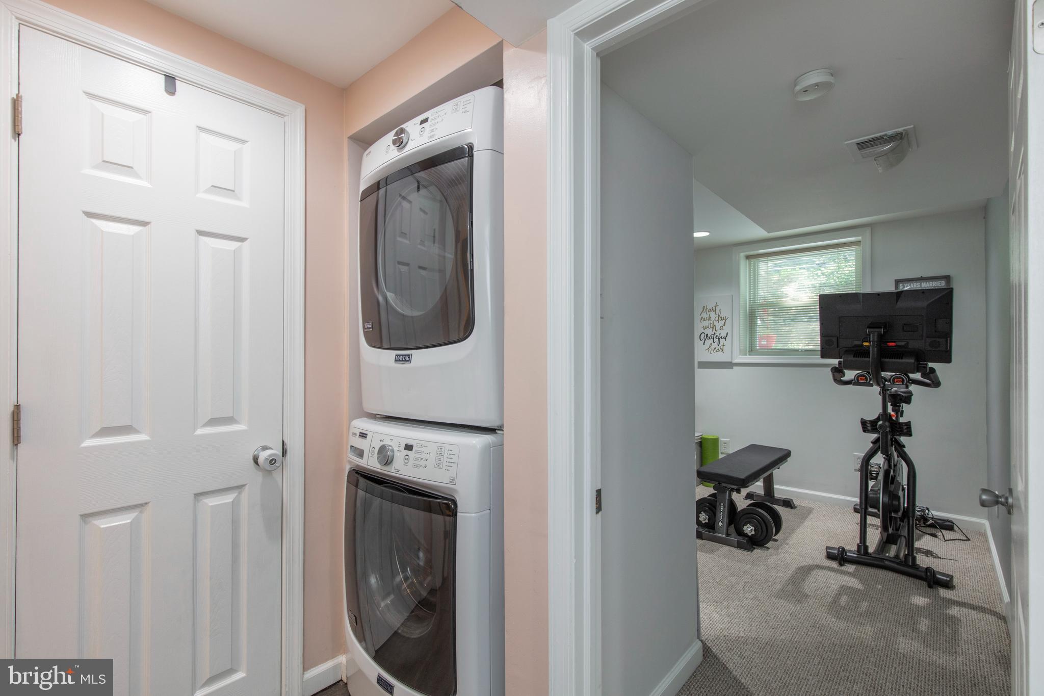 209 Glendale Road Havertown, PA 19083 - Photo 29 of 38 a view of a hallway with washer and dryer