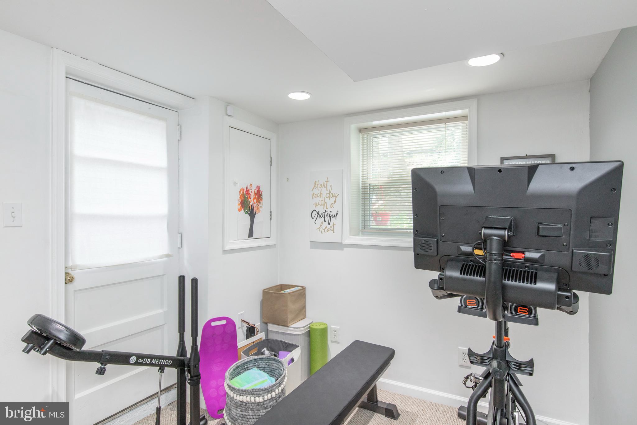 209 Glendale Road Havertown, PA 19083 - Photo 31 of 38 a view of a workspace with furniture and a window