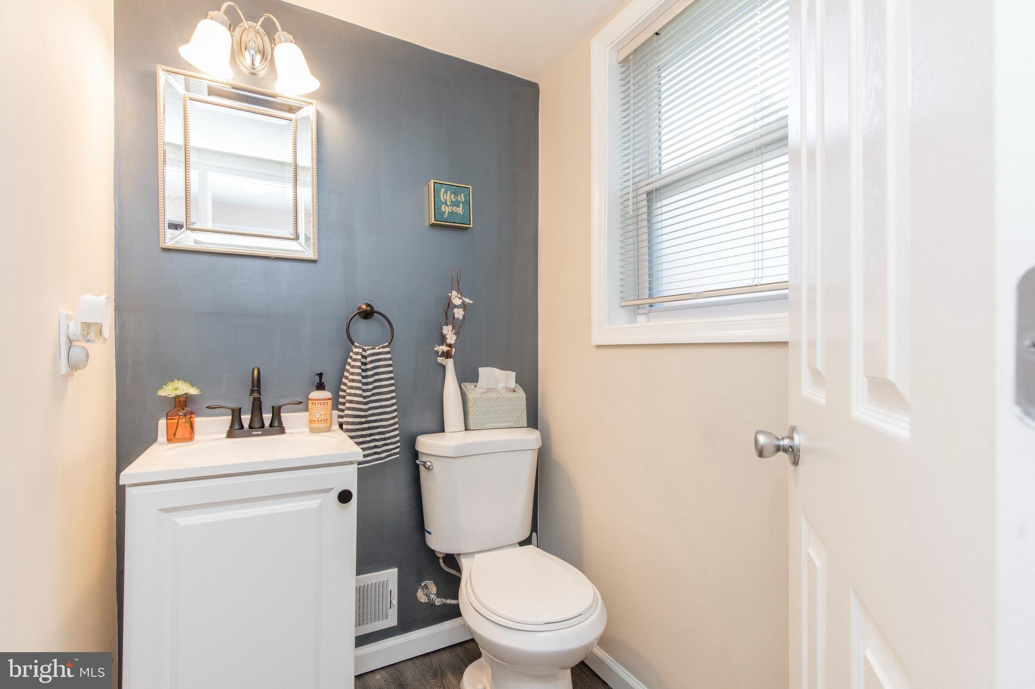 209 Glendale Road Havertown, PA 19083 - Photo 32 of 38 a bathroom with a toilet sink and mirror