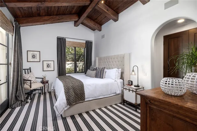 a bathroom with a shower and a sink