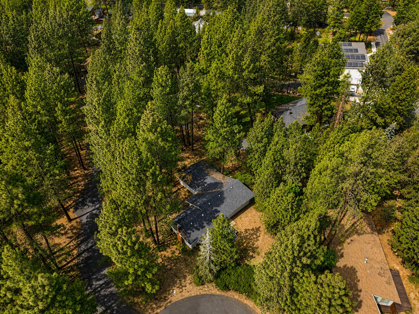 19968 Double Tree Court Bend, OR 97702 - Photo 22 of 28 a backyard of a house with lots of green space