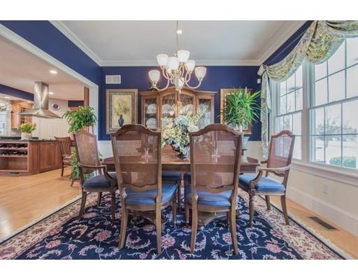 60 Eben Chamberlain Road Northbridge, MA 01588 - Photo 13 of 29 a dining room with furniture a large window and a chandelier