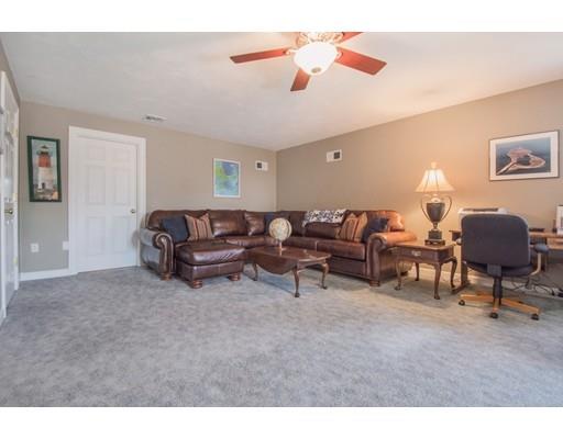 60 Eben Chamberlain Road Northbridge, MA 01588 - Photo 23 of 29 a living room with furniture and a lamp