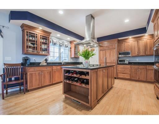 60 Eben Chamberlain Road Northbridge, MA 01588 - Photo 5 of 29 a kitchen with stainless steel appliances granite countertop a stove a sink and a wooden floors