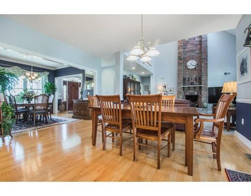 60 Eben Chamberlain Road Northbridge, MA 01588 - Photo 7 of 29 a dining room with furniture a chandelier and wooden floor