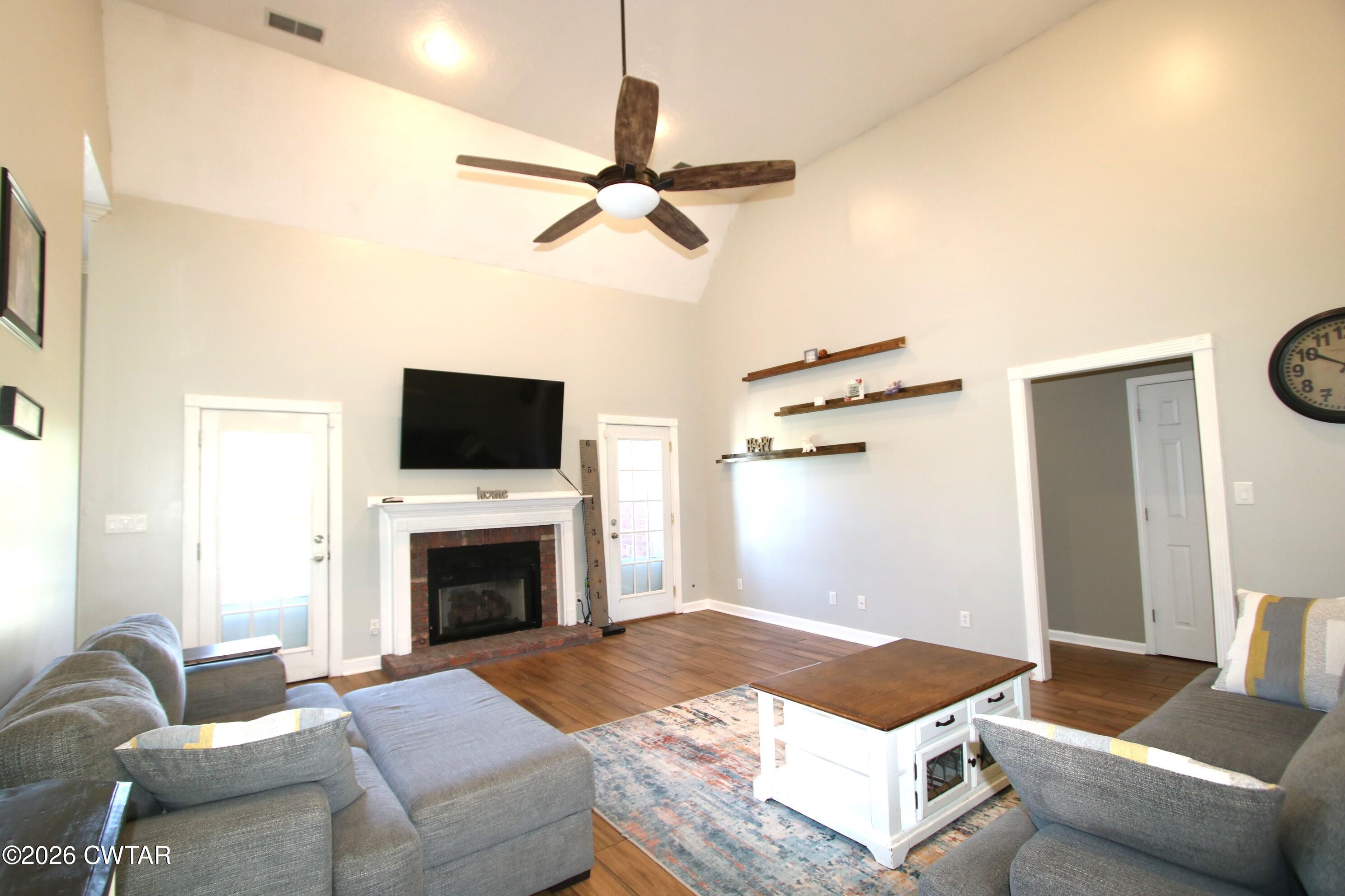 98 Browning Road Milan, TN 38358 - Photo 15 of 59 a bedroom with a bed and a television