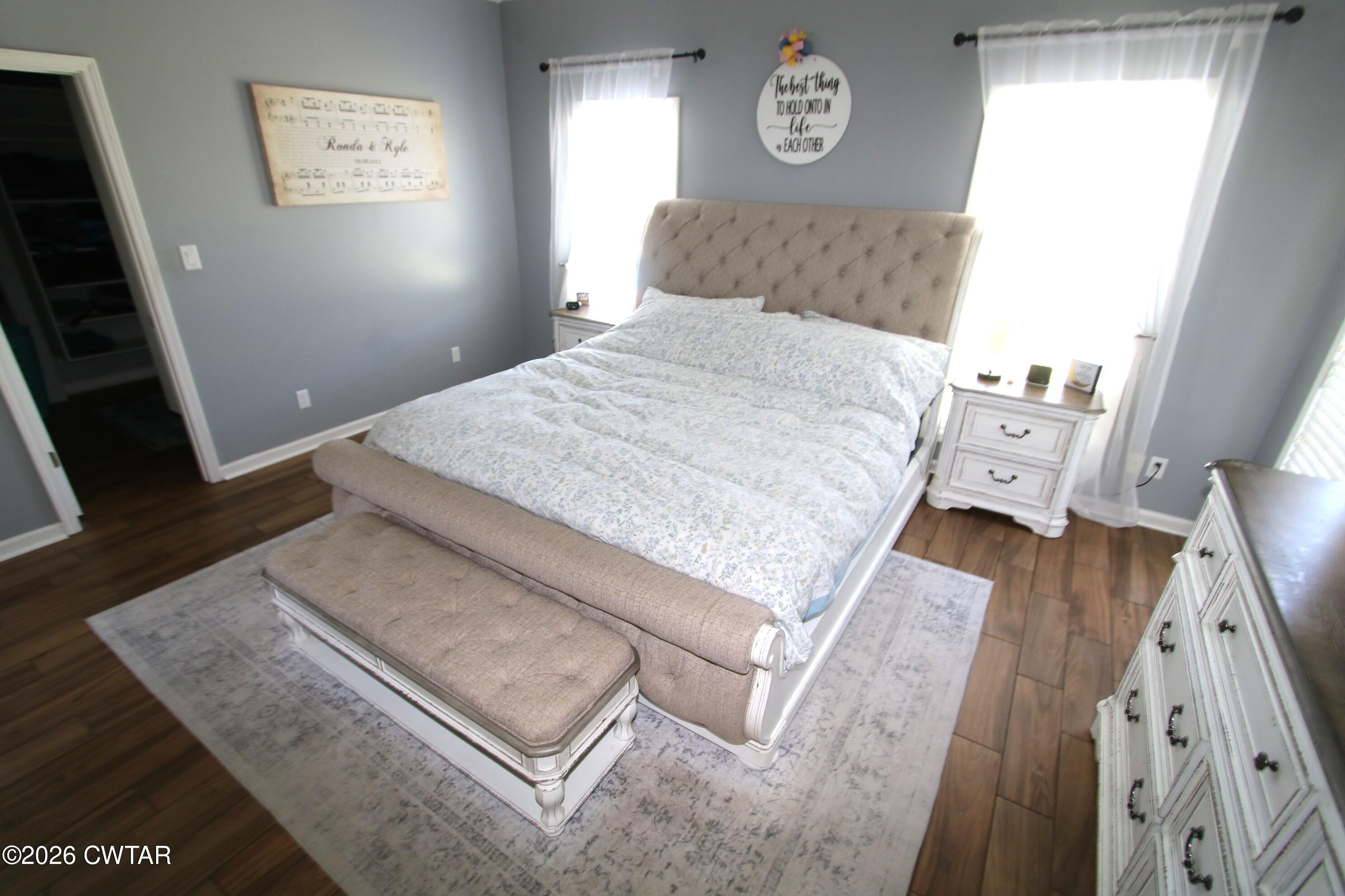 98 Browning Road Milan, TN 38358 - Photo 19 of 59 a living room with a bed furniture and a window