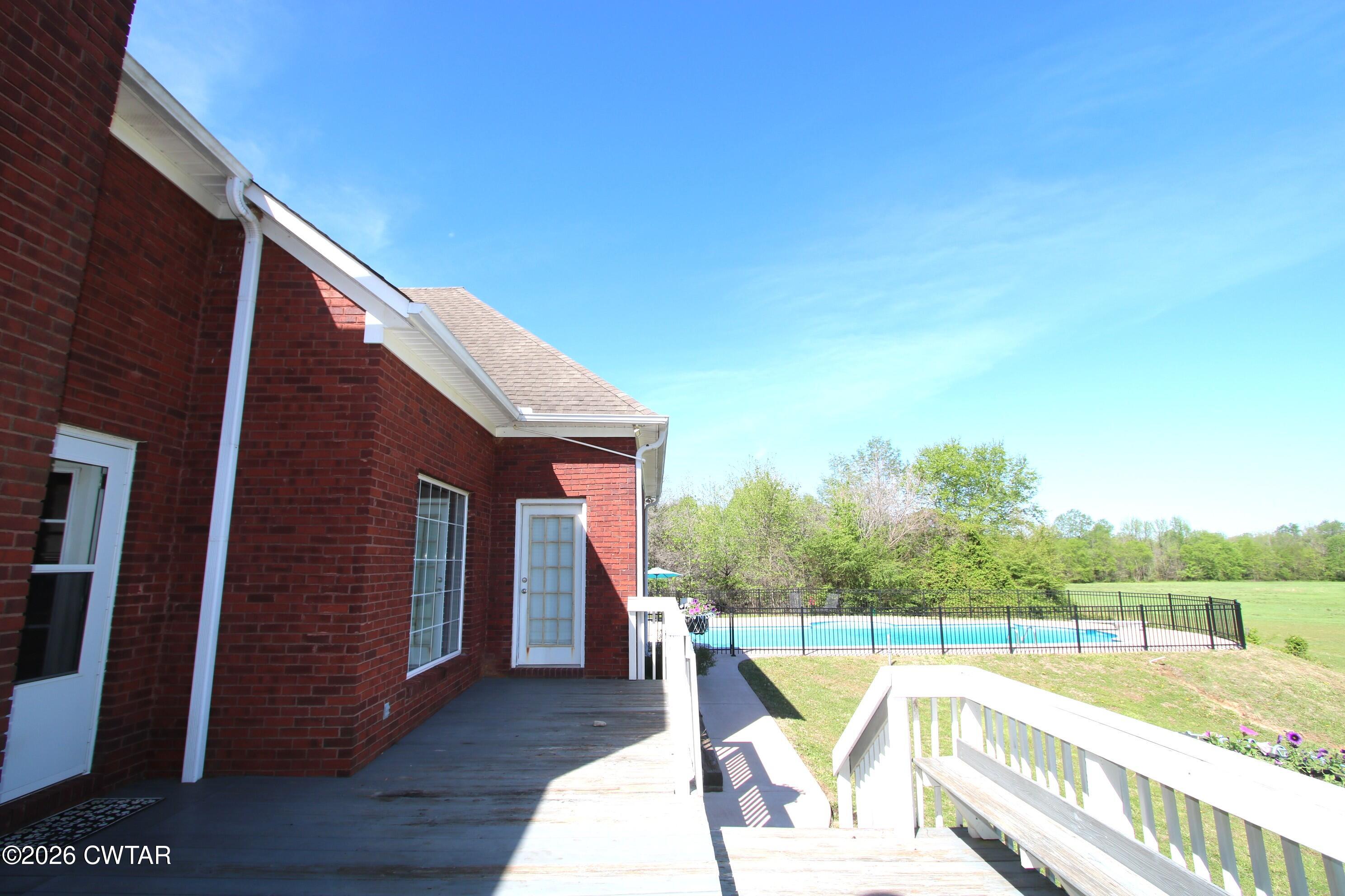 98 Browning Road Milan, TN 38358 - Photo 46 of 59 a view of a swimming pool with a patio