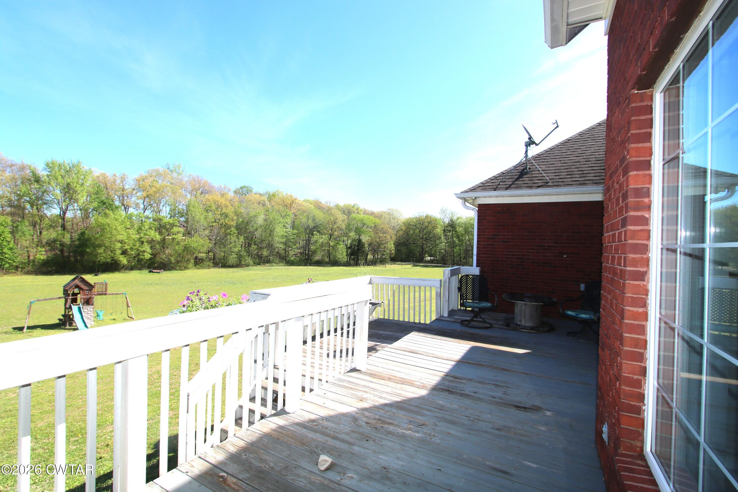 98 Browning Road Milan, TN 38358 - Photo 47 of 59 a view of a deck with a yard