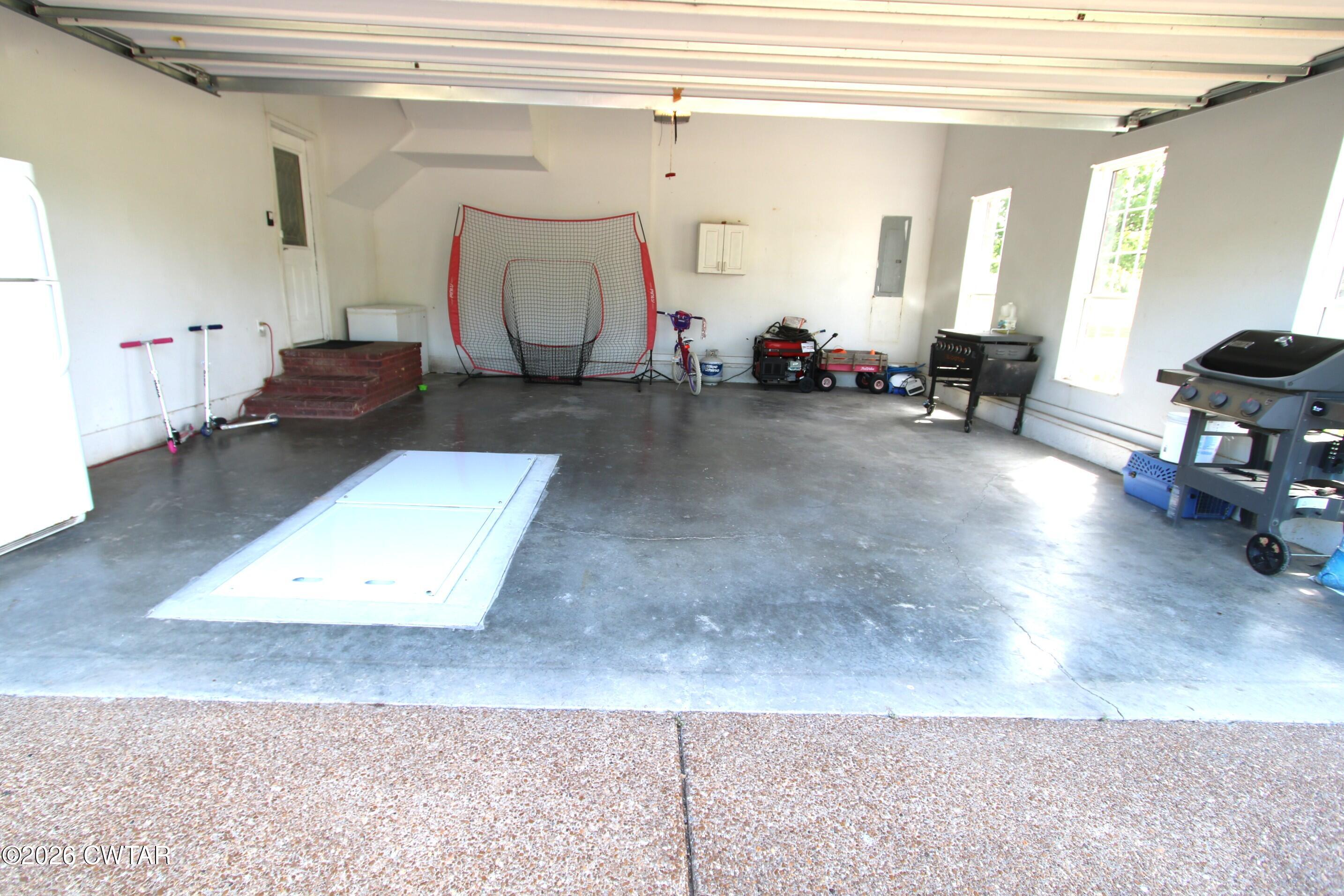 98 Browning Road Milan, TN 38358 - Photo 48 of 59 a living room with furniture and a window
