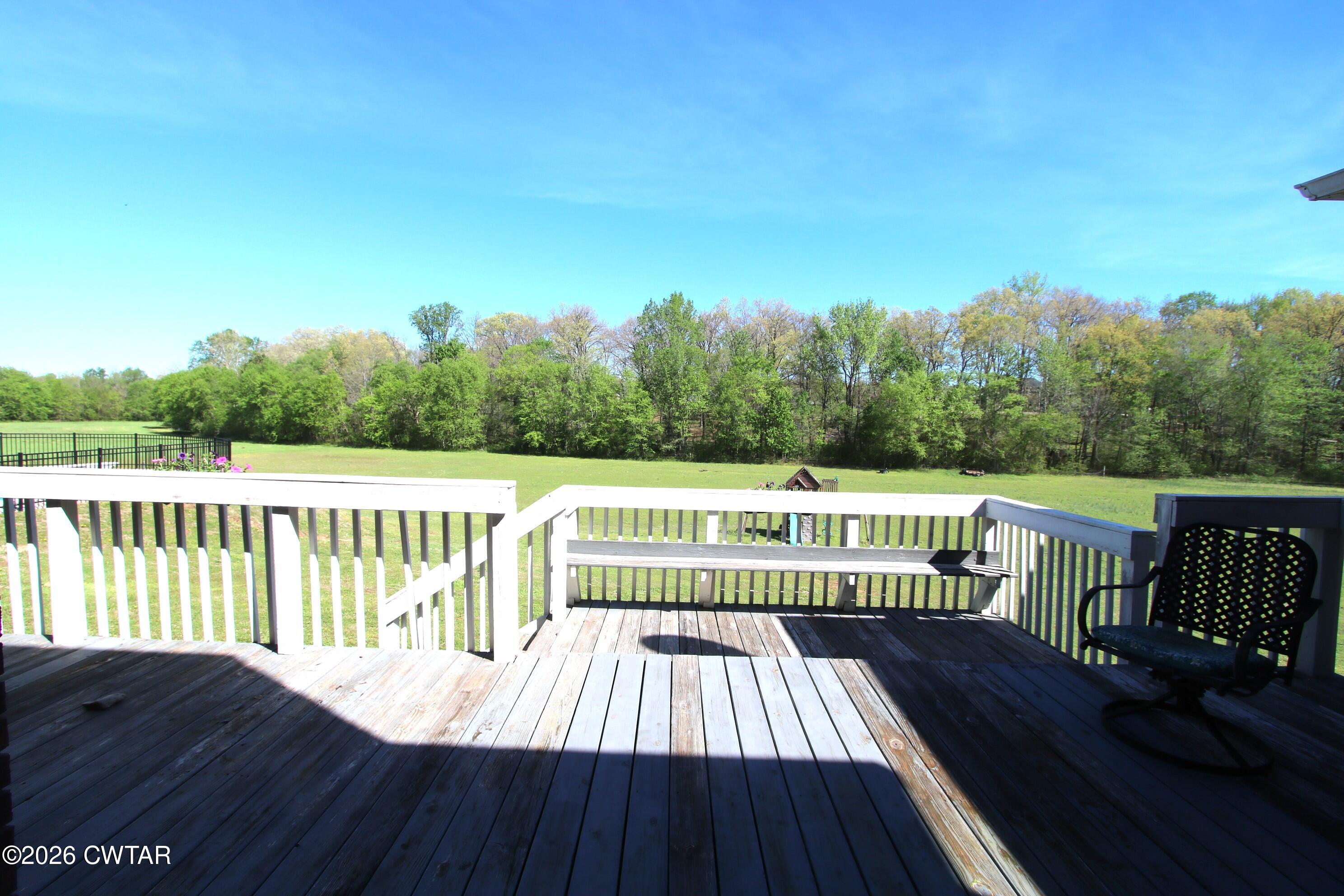 98 Browning Road Milan, TN 38358 - Photo 49 of 59 a view of balcony with wooden floor and fence