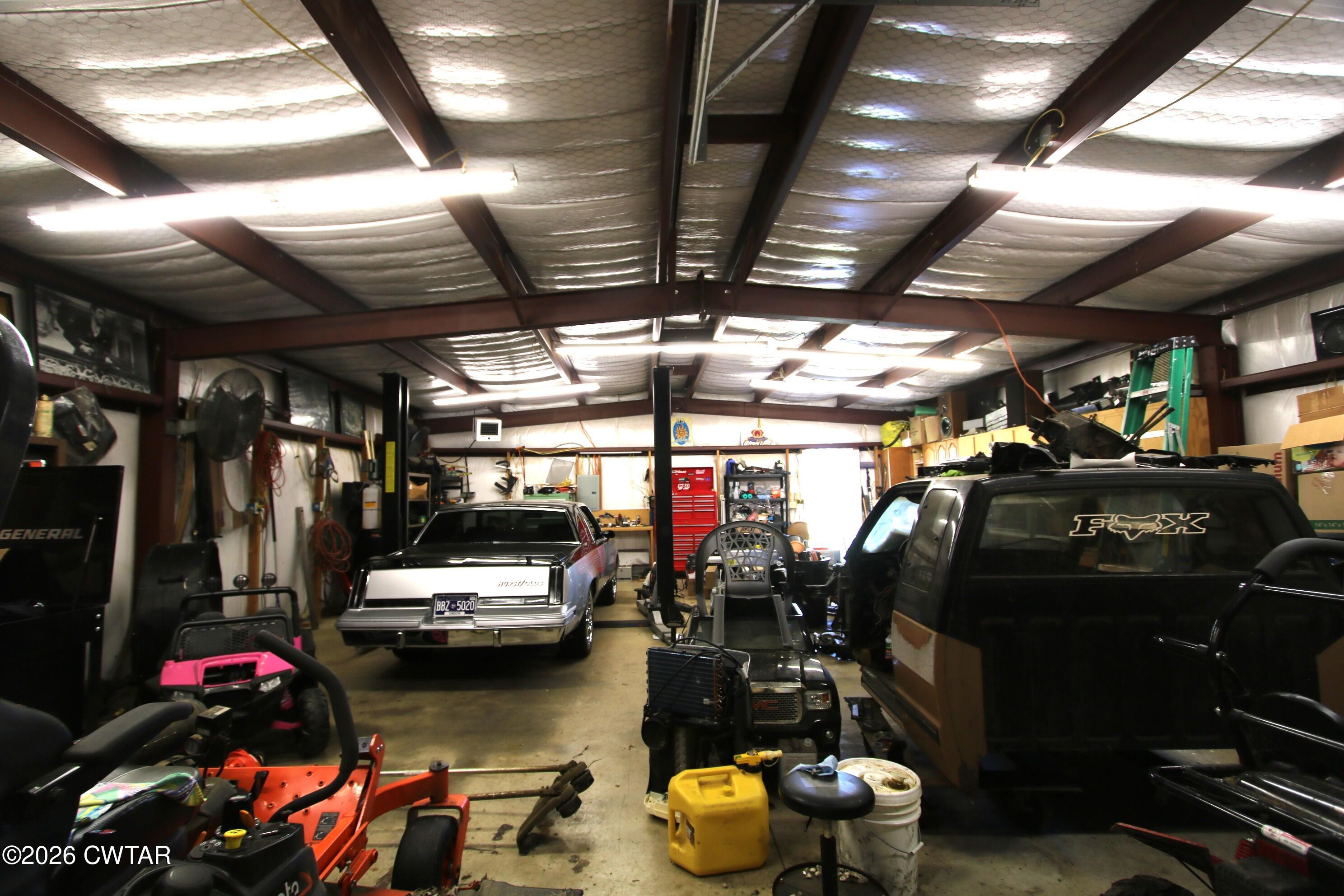 98 Browning Road Milan, TN 38358 - Photo 52 of 59 a view of a room with lots of gym equipment