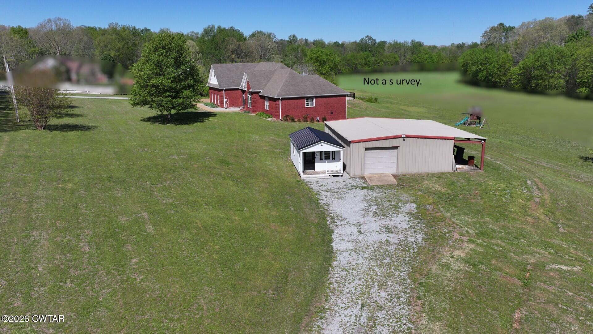 98 Browning Road Milan, TN 38358 - Photo 56 of 59 a view of a town with mountains in the background