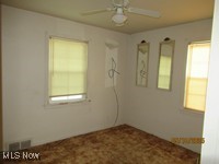 3526 Radcliffe Road Cleveland Heights, OH 44121 - Photo 9 of 10 Spare room featuring healthy amount of natural light and a ceiling fan