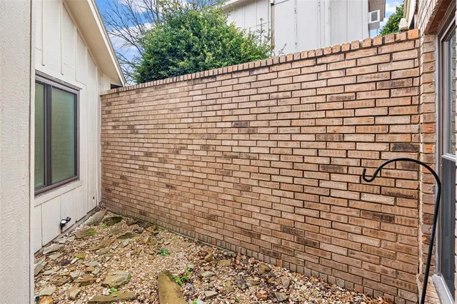 a view of a brick wall