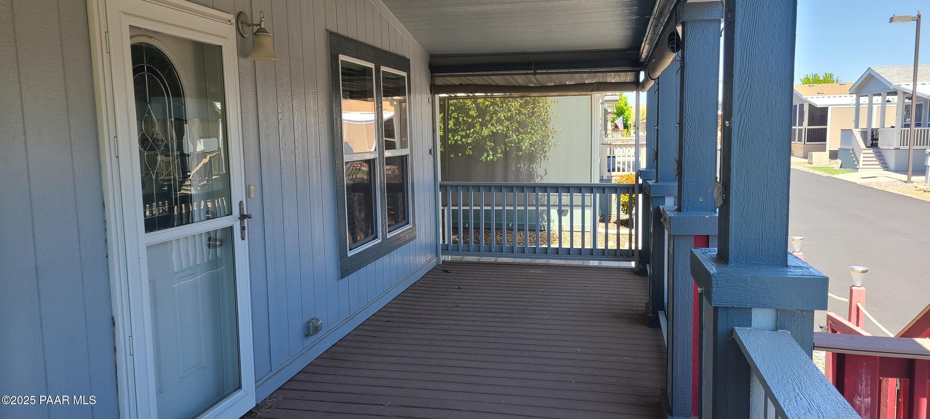 2146 Jackrabbit Drive, Unit 2146 Dewey, AZ 86327 - Photo 4 of 48 a view of a hallway with wooden floor and entryway