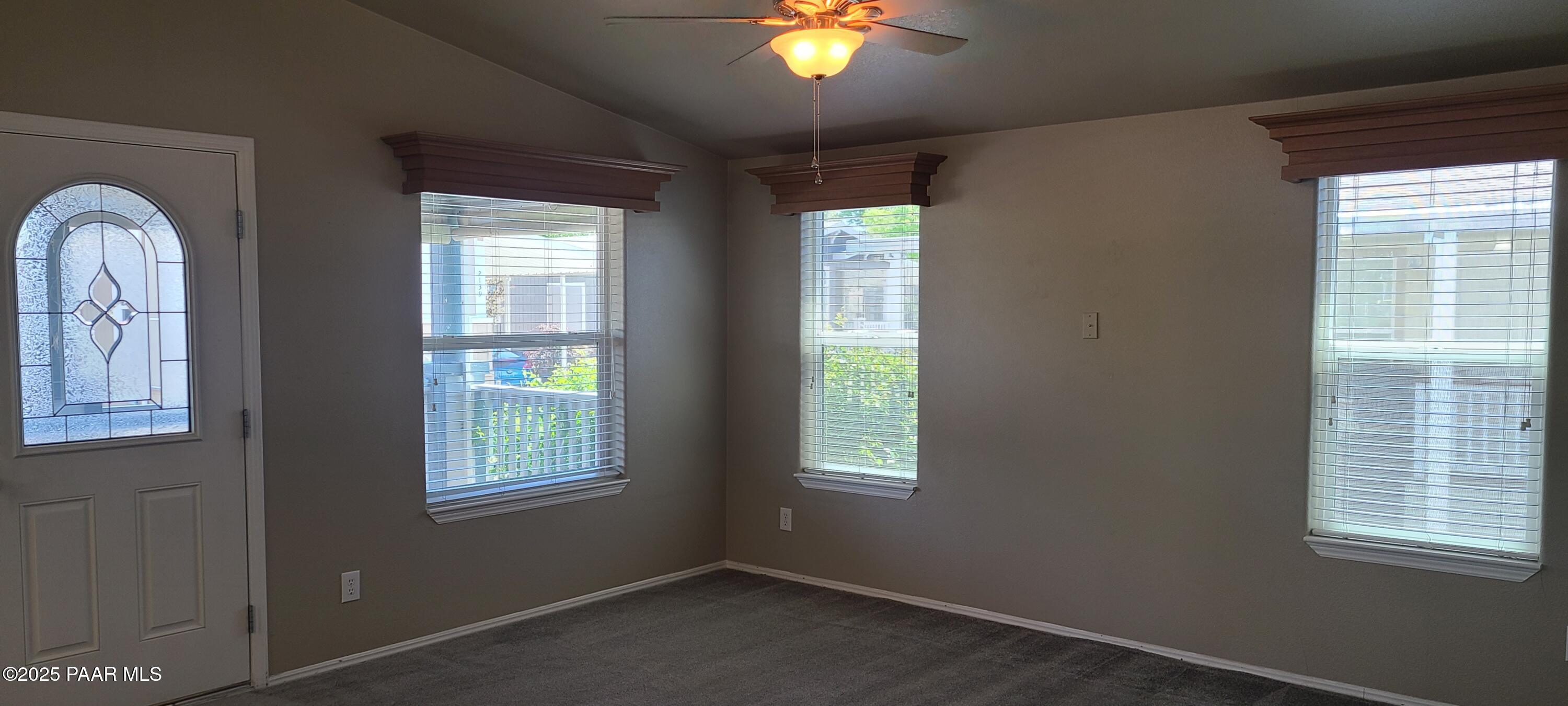2146 Jackrabbit Drive, Unit 2146 Dewey, AZ 86327 - Photo 5 of 48 a view of an empty room with a window