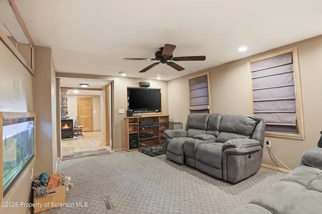 a kitchen with stainless steel appliances kitchen island granite countertop a sink stove cabinets and refrigerator