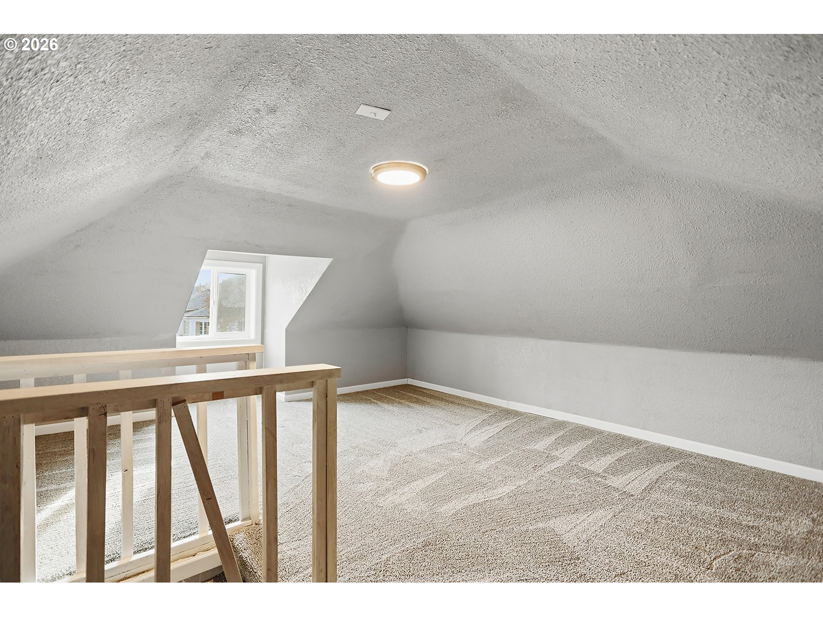 417 East Court Street Goldendale, WA 98620 - Photo 27 of 38 a view of an empty room with wooden floor and a window