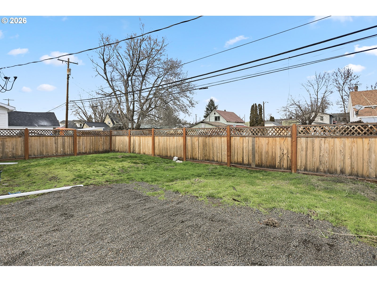 417 East Court Street Goldendale, WA 98620 - Photo 34 of 38 a view of a backyard with wooden fence