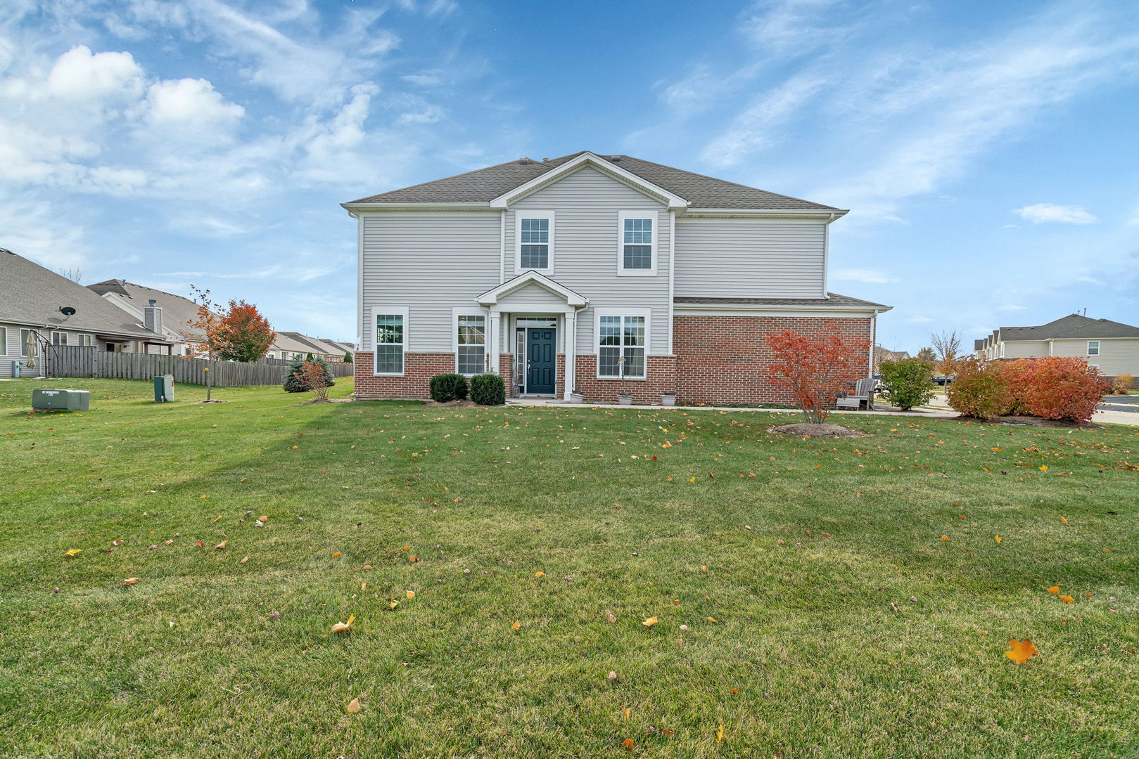 2108 Pembridge Lane Joliet, IL 60431 - Photo 35 of 35 a front view of a house with garden
