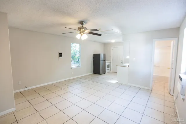 a view of an empty room and window