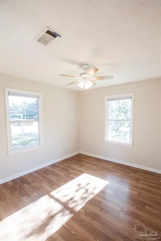 a view of an empty room and window
