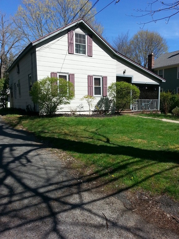 151 Riverside Drive Northampton, MA 01062 - Photo 4 of 17 a front view of a house with a yard