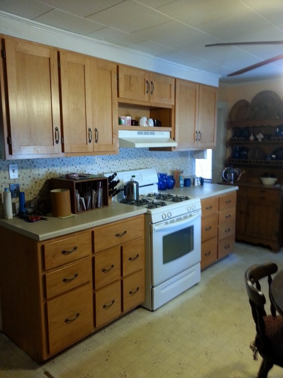 151 Riverside Drive Northampton, MA 01062 - Photo 8 of 17 a kitchen with stainless steel appliances granite countertop a stove a sink and a refrigerator